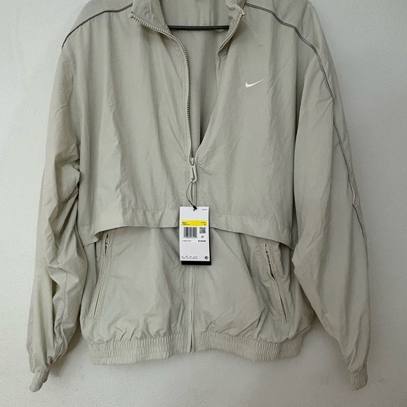 Nike Solo Swoosh Track Jacket in Light Bone/White - Picture 2 of 9